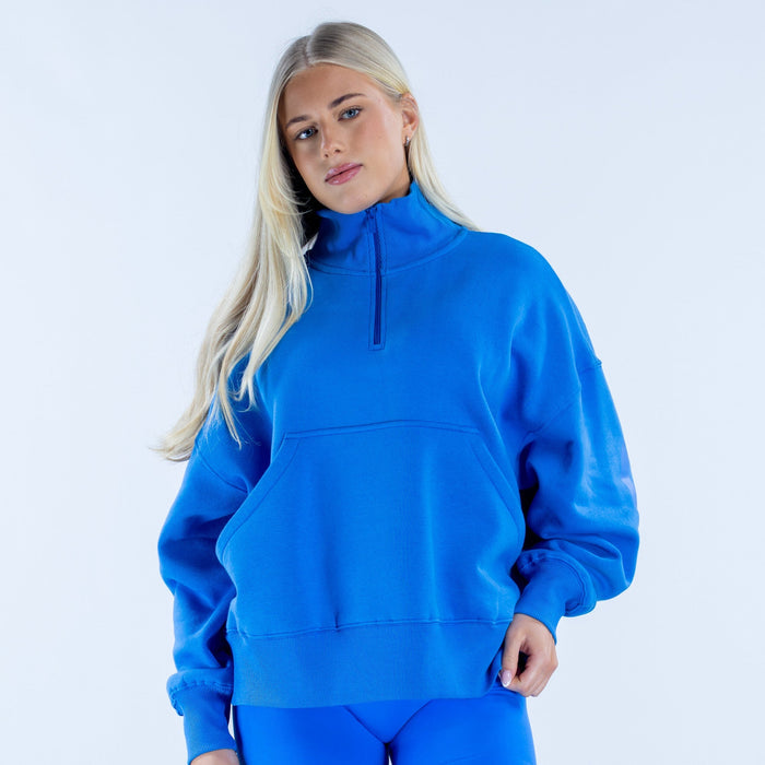 Blue quarter-zip pullover sweatshirt with front kangaroo pocket and ribbed hem