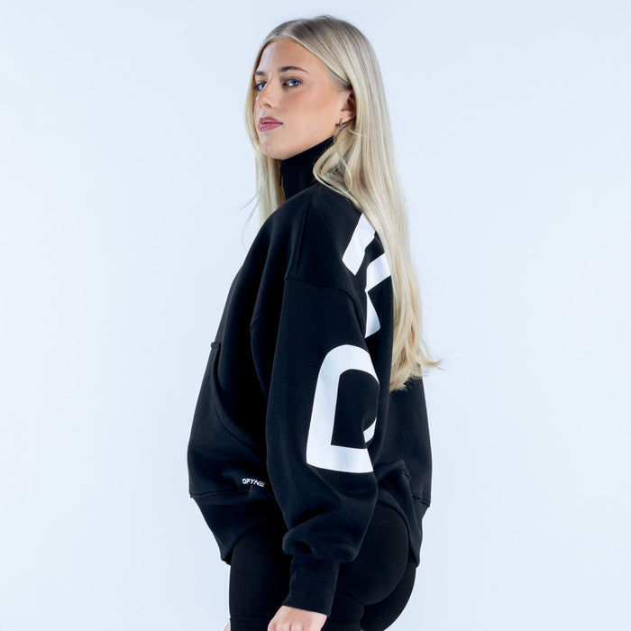 Black quarter-zip sweatshirt with large white sleeve graphic and kangaroo pocket