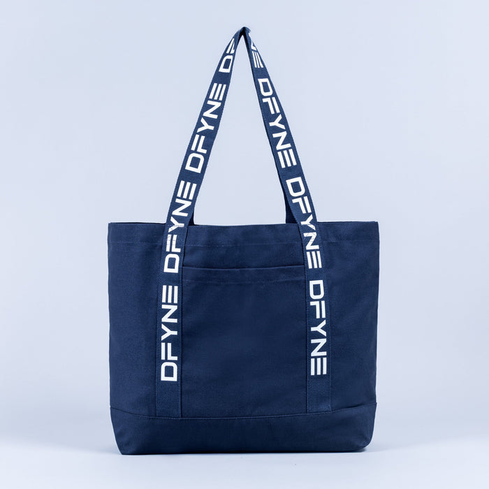 Navy canvas tote bag with vertical logo panel and navy webbing handles