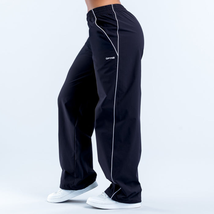 Dark track pants with elastic waist, white side stripe, small logo
