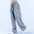 Light gray wide-leg jogger pants with elastic waistband and large front logo print