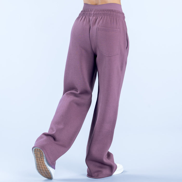 Purple wide-leg jogger pants with elastic waistband and back patch pockets