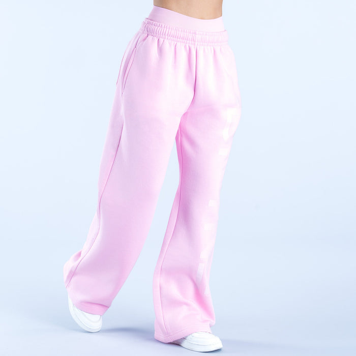 Pink wide-leg jogger pants with ribbed cuff and gathered elastic waistband.