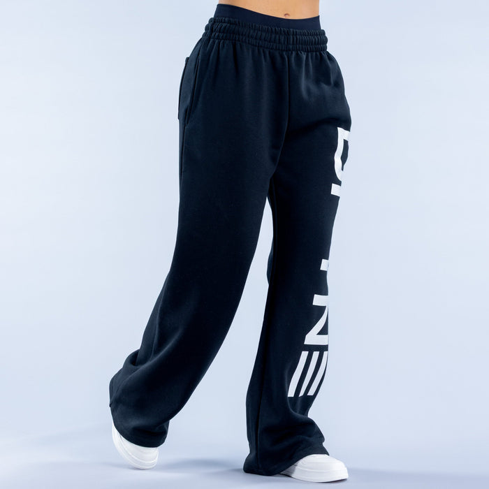Dark navy wide-leg jogger pants with white side lettering logo on open leg