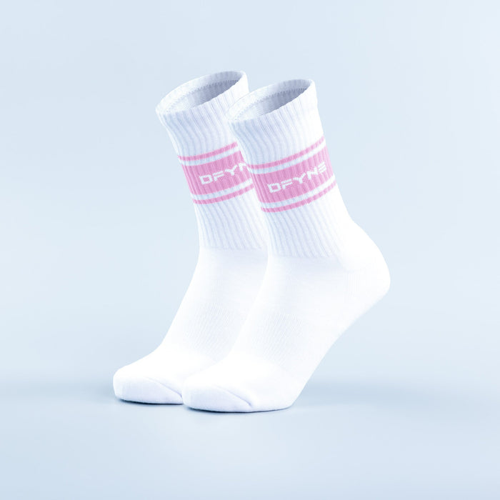 White crew sports socks with pink stripe bands and ribbed cuff