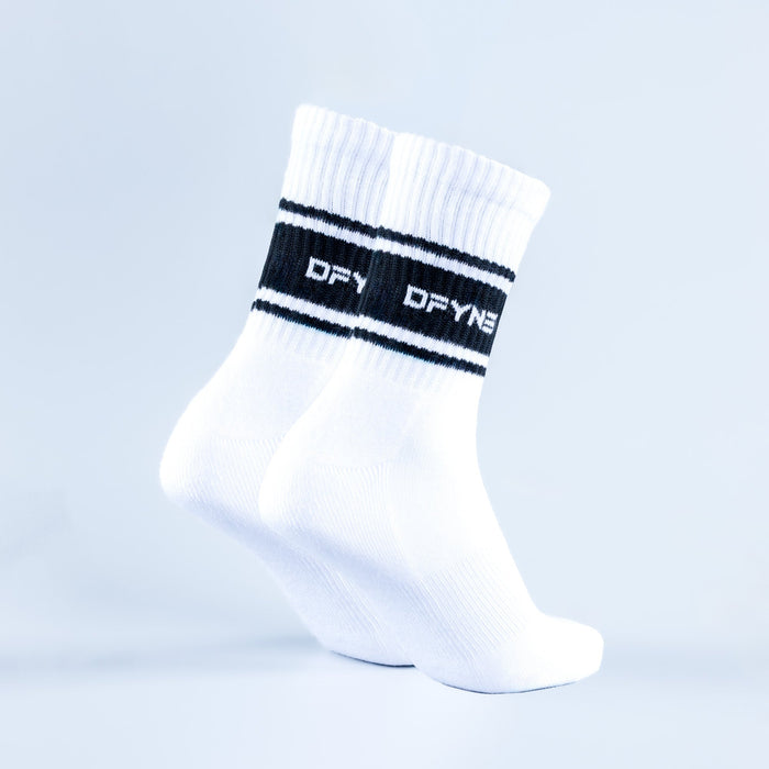 White crew sports socks with black stripe logo on cuff