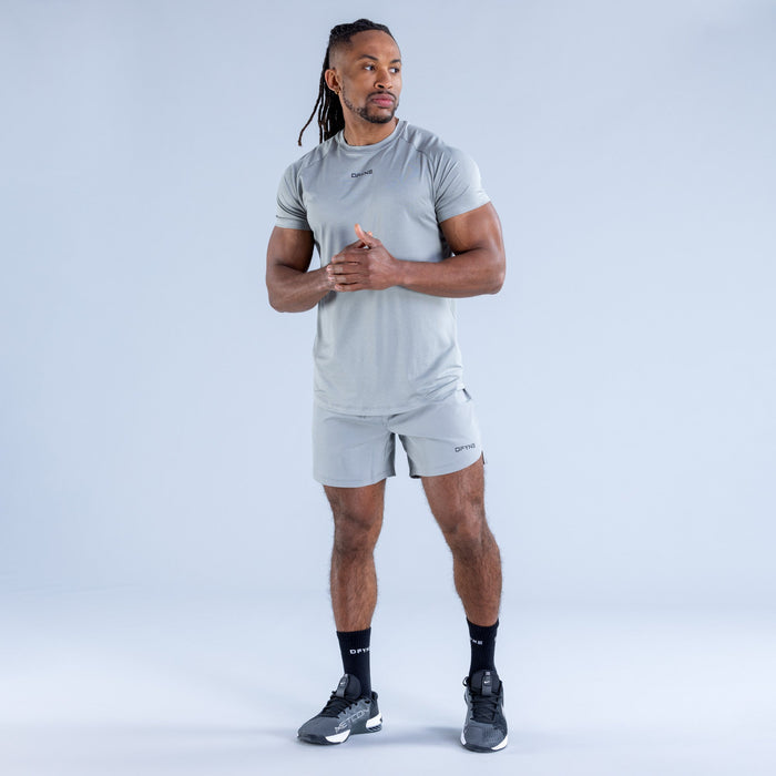 Light gray training T-shirt with short sleeves and small chest logo