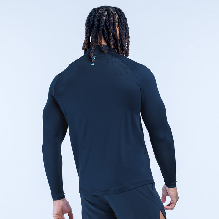 Dark navy quarter-zip pullover with long sleeves and back hem logo detail
