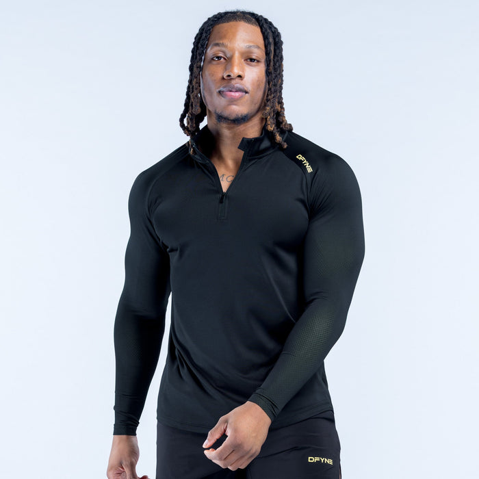 Black quarter-zip athletic top with long sleeves and chest logo