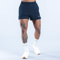 Navy training shorts with elastic waistband and small logo on leg