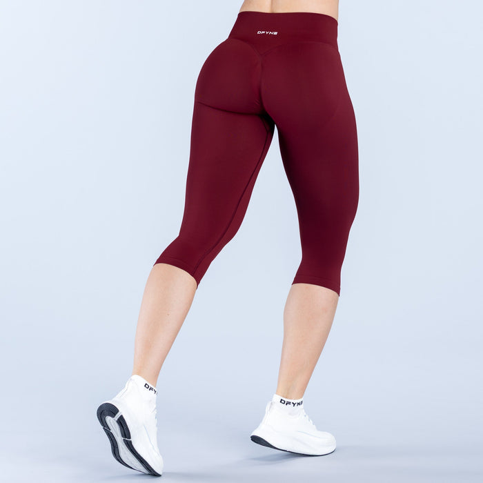 Vision capri pants with straight waistband, burgundy stretch knit, back view, 3/4 length