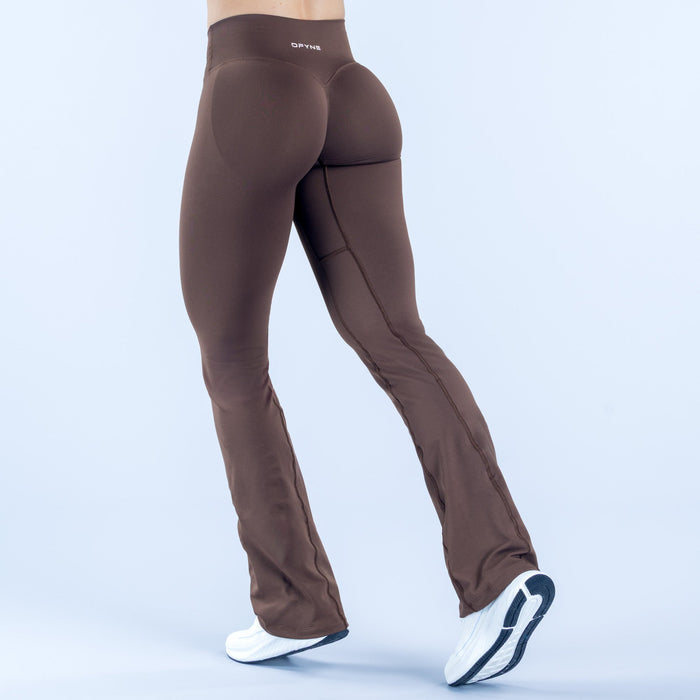 Brown flared leggings, back view, stitched seams and wide flare