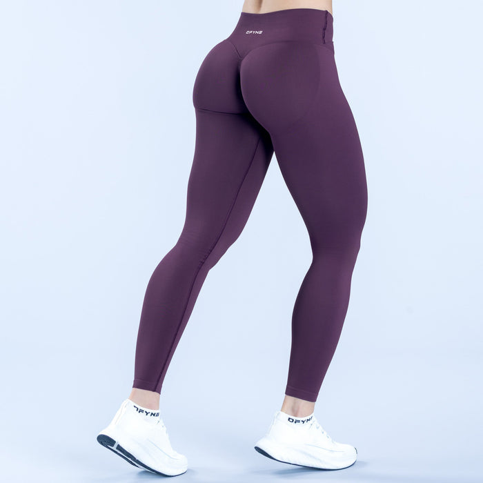 Dark purple high-rise full-length leggings with smooth stretch fit and side logo