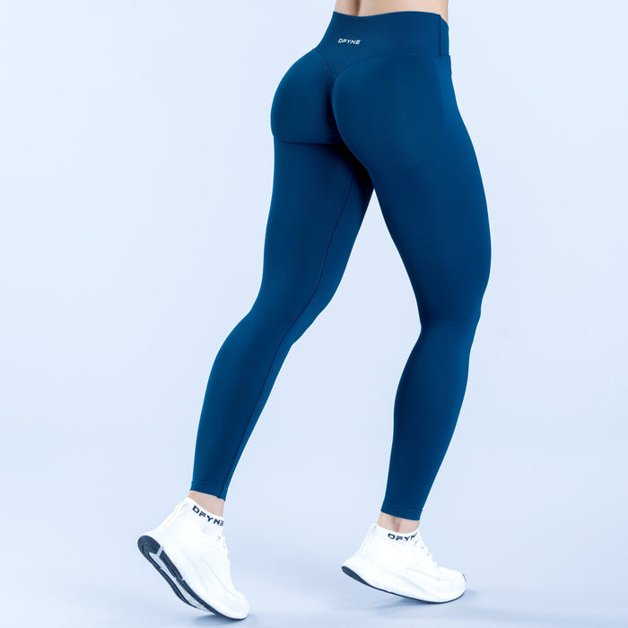 High-waist dark teal leggings, full-length, back view, small logo near hip