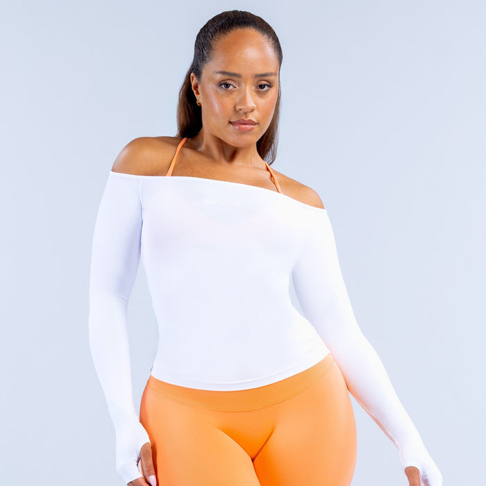 White off-shoulder long sleeve fitted top with straight neckline and hem