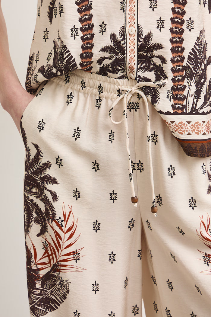 Women's satin nude trousers with floral print "Miho"