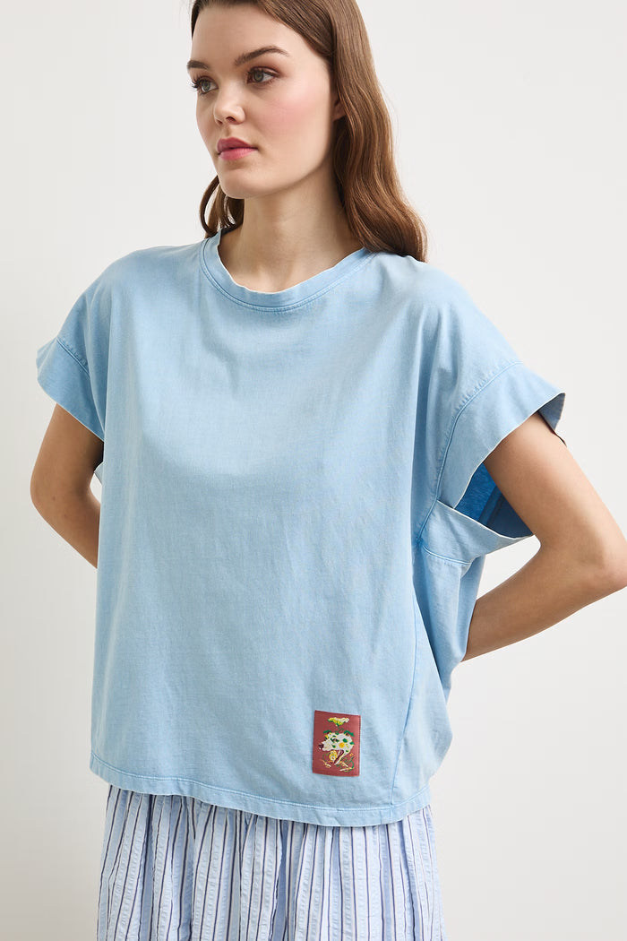 Women's sky-blue t-shirt with abstract "Roberto Azure Cagundela" print